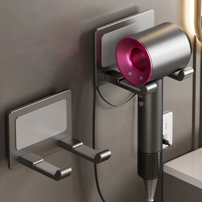 GlamRack wall-mounted aluminum hair dryer and straightener holder for bathroom.