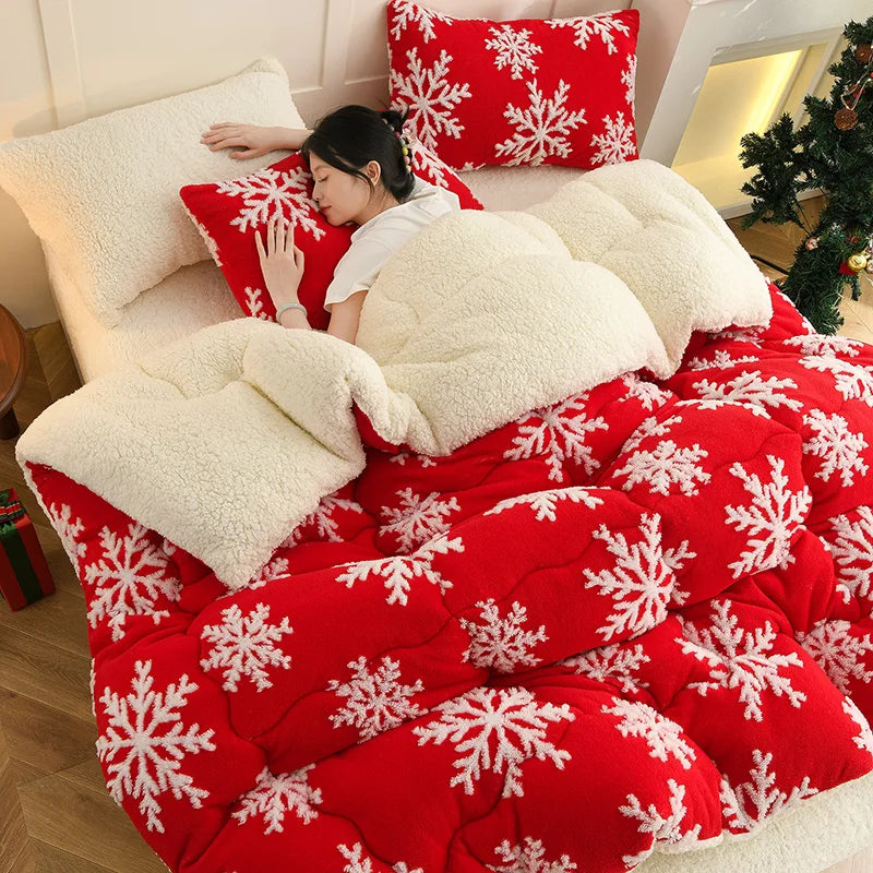 SnowHug soft winter blanket with snowflake design on bed