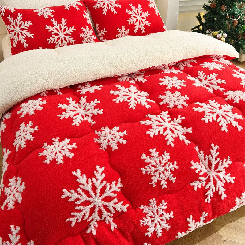 SnowHug soft winter blanket with snowflake design on bed