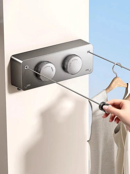 FlexiLine extendable retractable indoor outdoor clothesline mounted on wall.