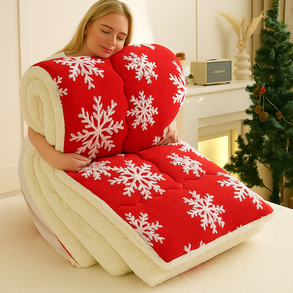 SnowHug soft winter blanket with snowflake design on bed